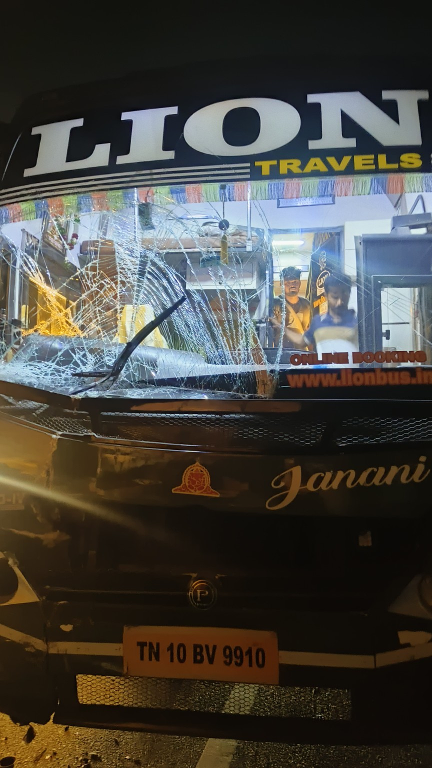 Front of the sleeper bus after the collision, showing its shattered windshield